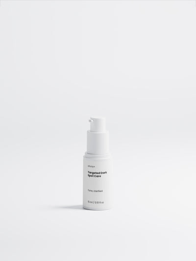 Skincare bottle labeled 'Targeted Dark Spot Care' on a white background