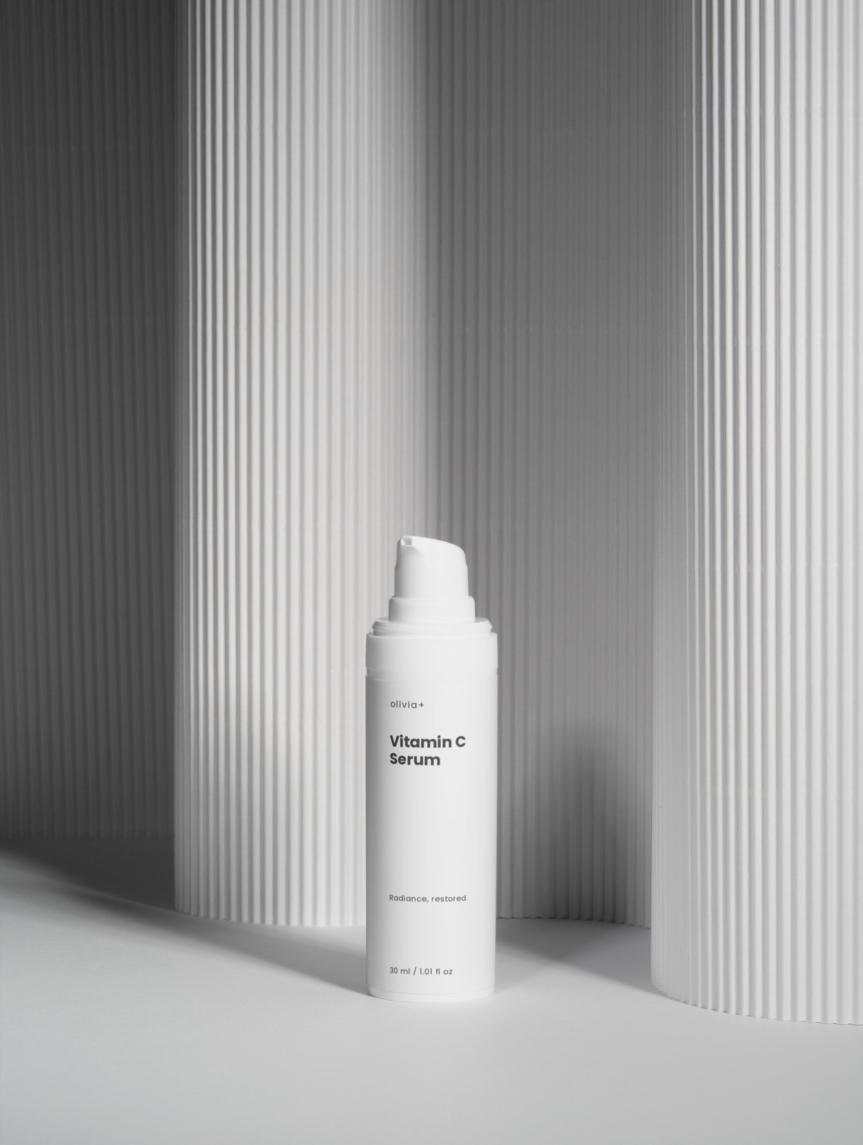 Skincare bottle labeled 'MONO SKIN' against a neutral background