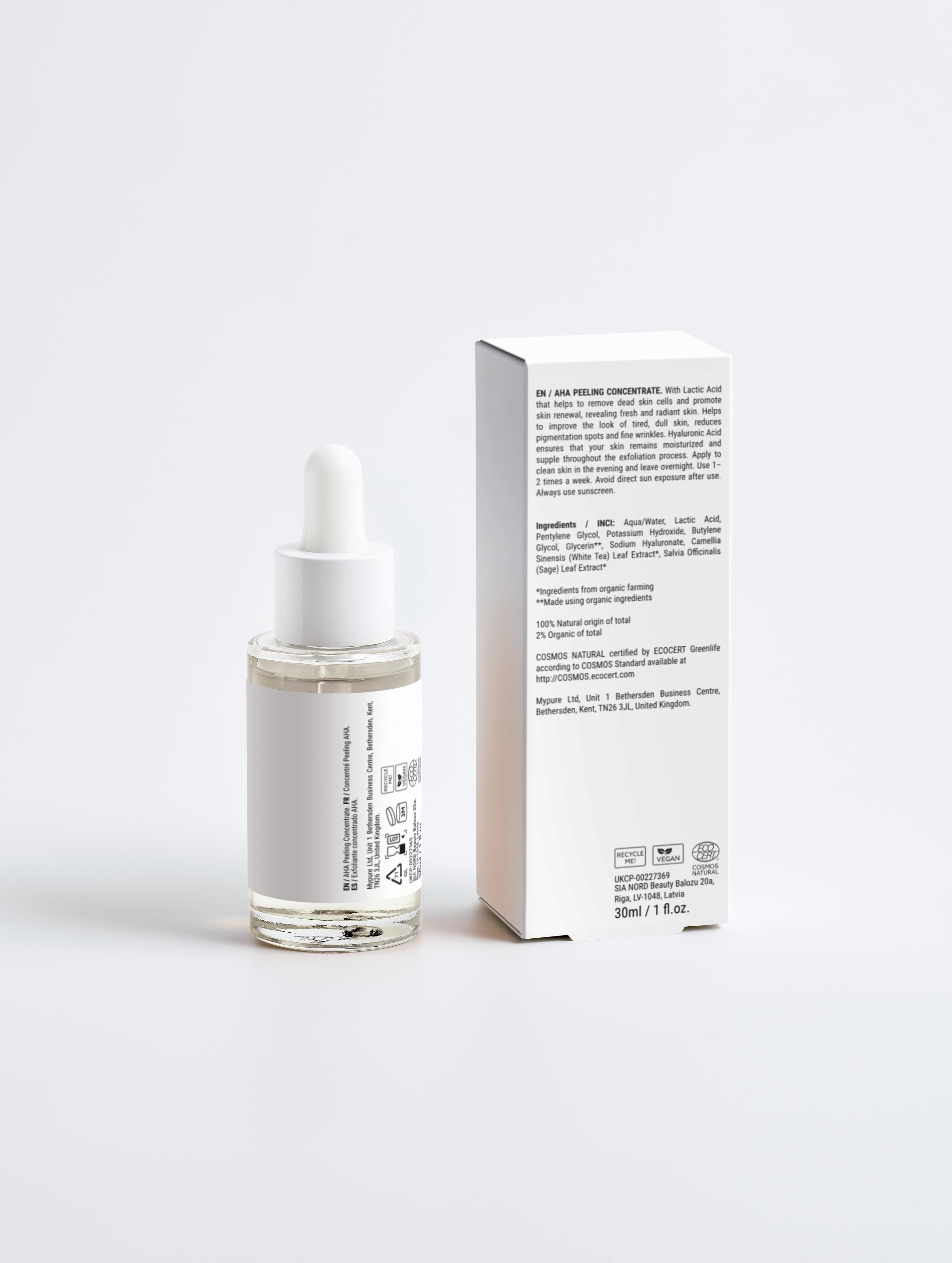 Skincare serum bottle with dropper and its packaging on a white background