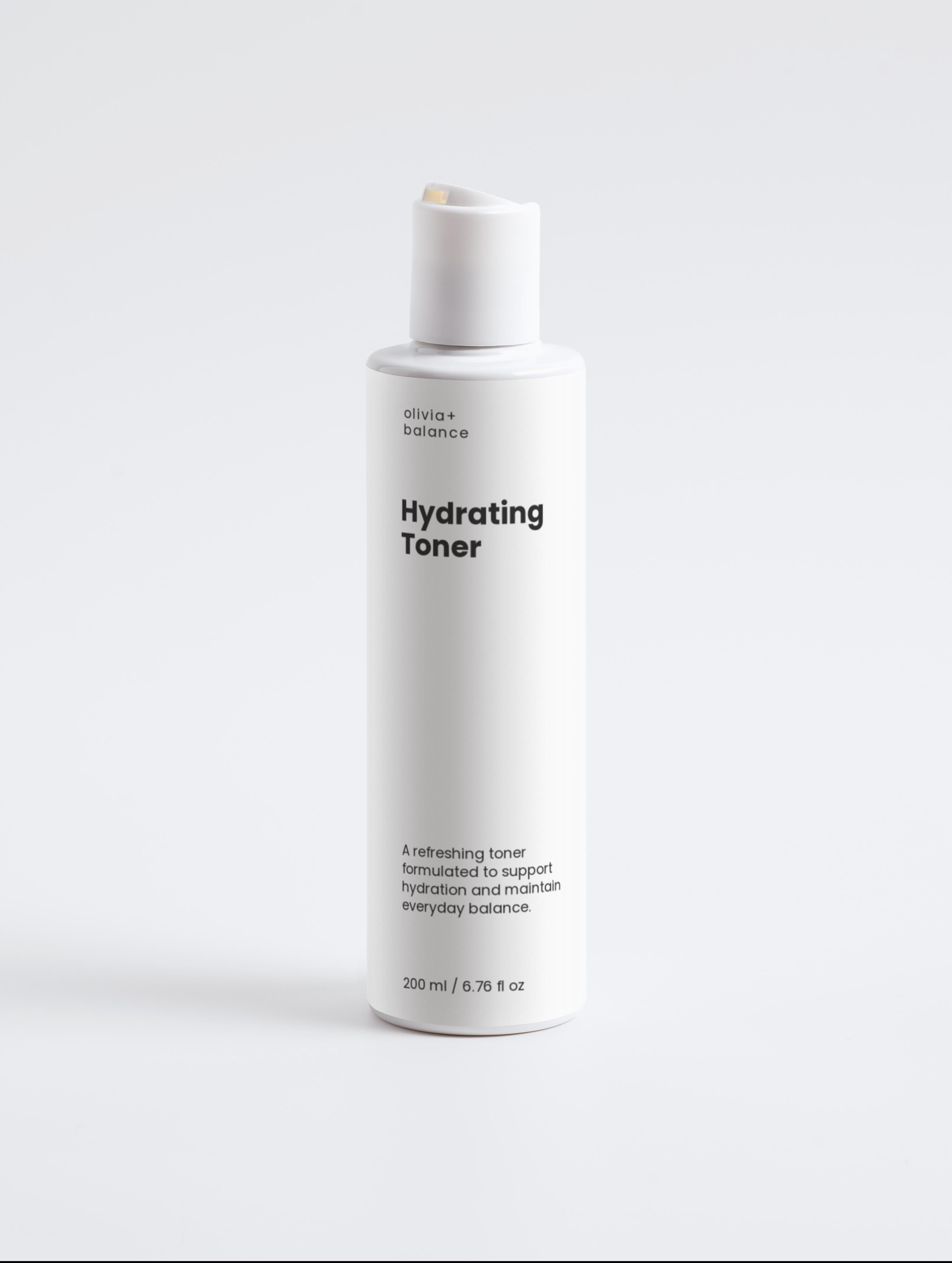 White bottle of 'Hydrating Toner' on a light gray background