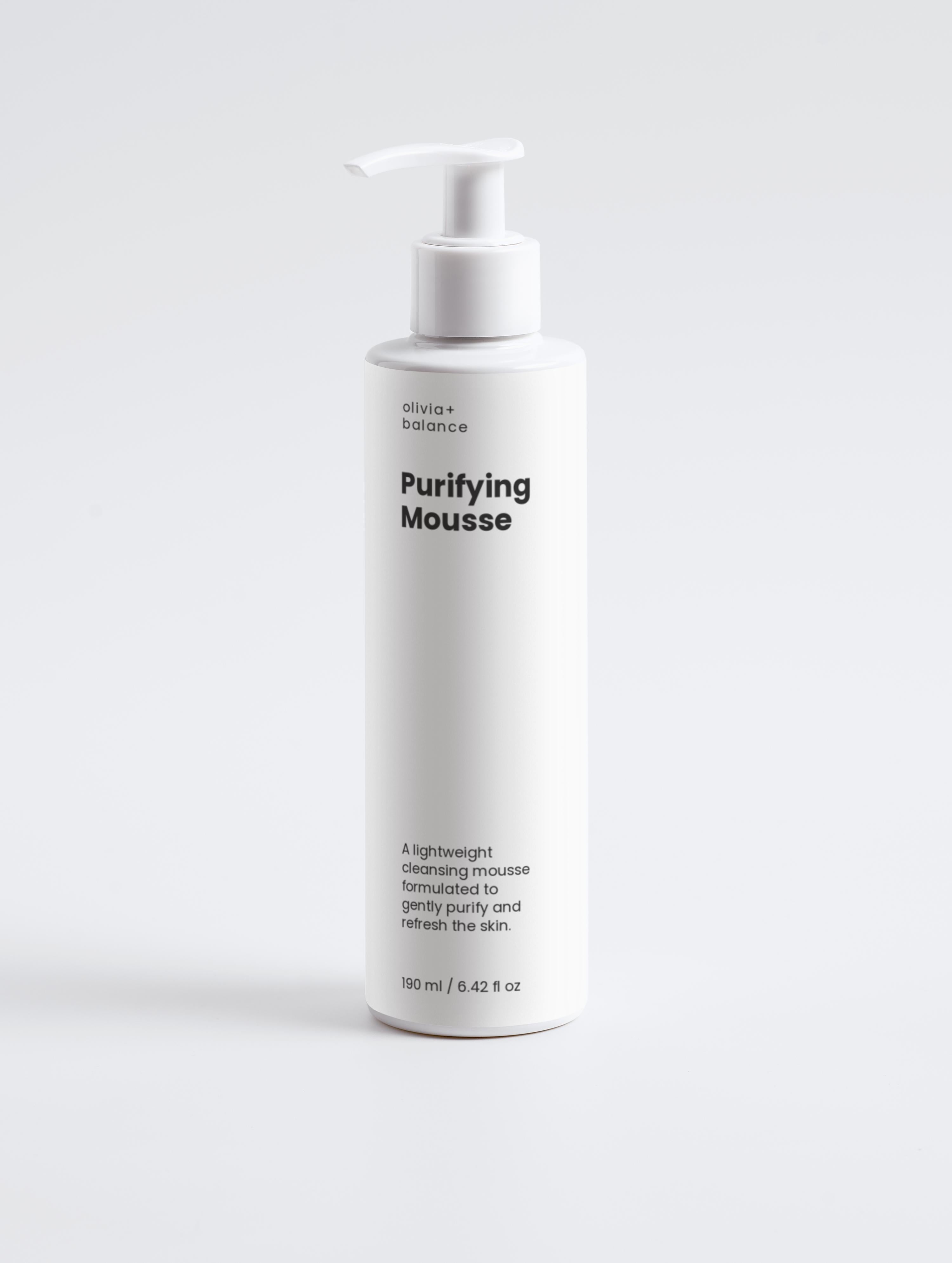 Bottle of Purifying Mousse on a white background