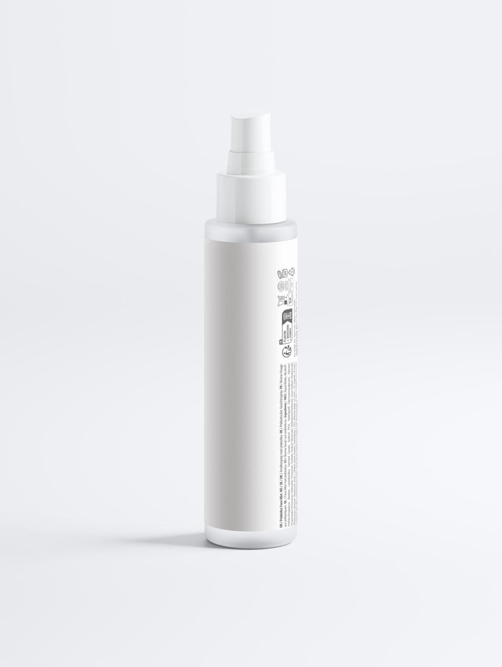 White spray bottle with a label on a light gray background
