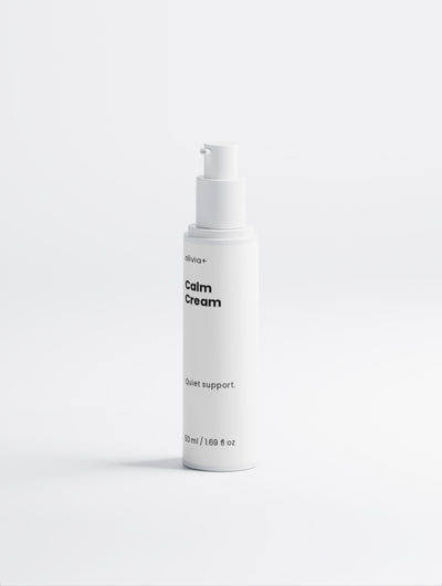 White bottle of Calm Cream on a white background