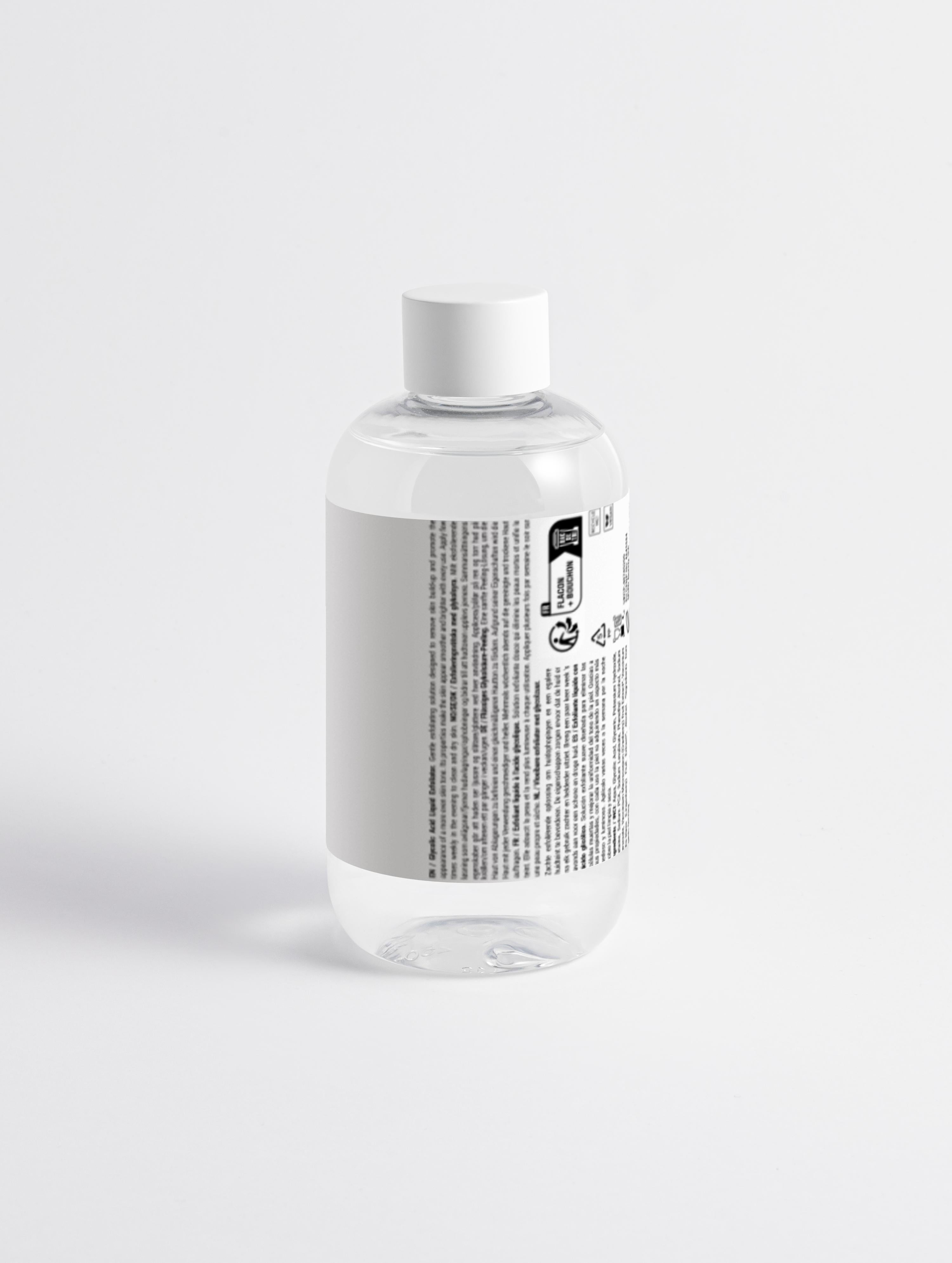 Clear bottle with a label on a white background