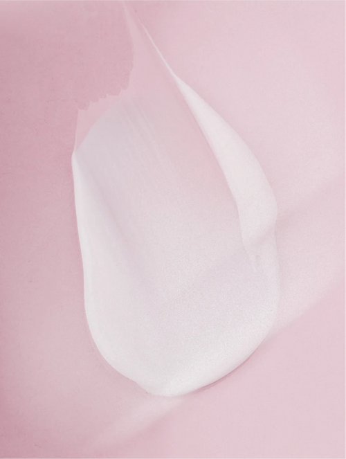 White teardrop-shaped object on a pink background