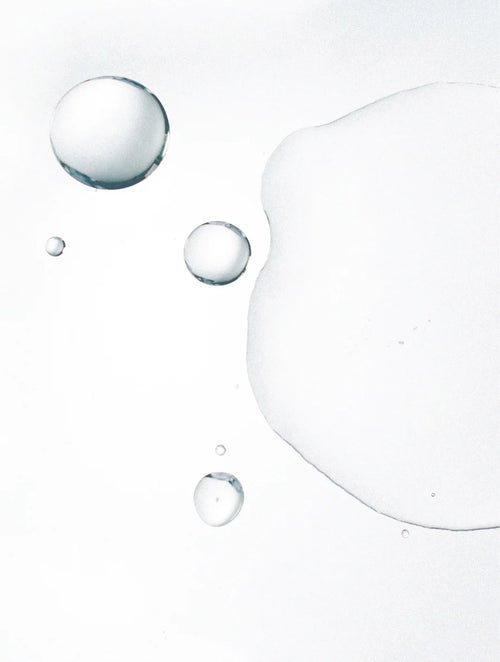 Bubbles floating on a white background