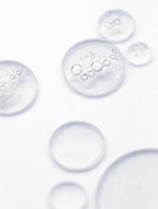 Clear bubbles on a light gray background