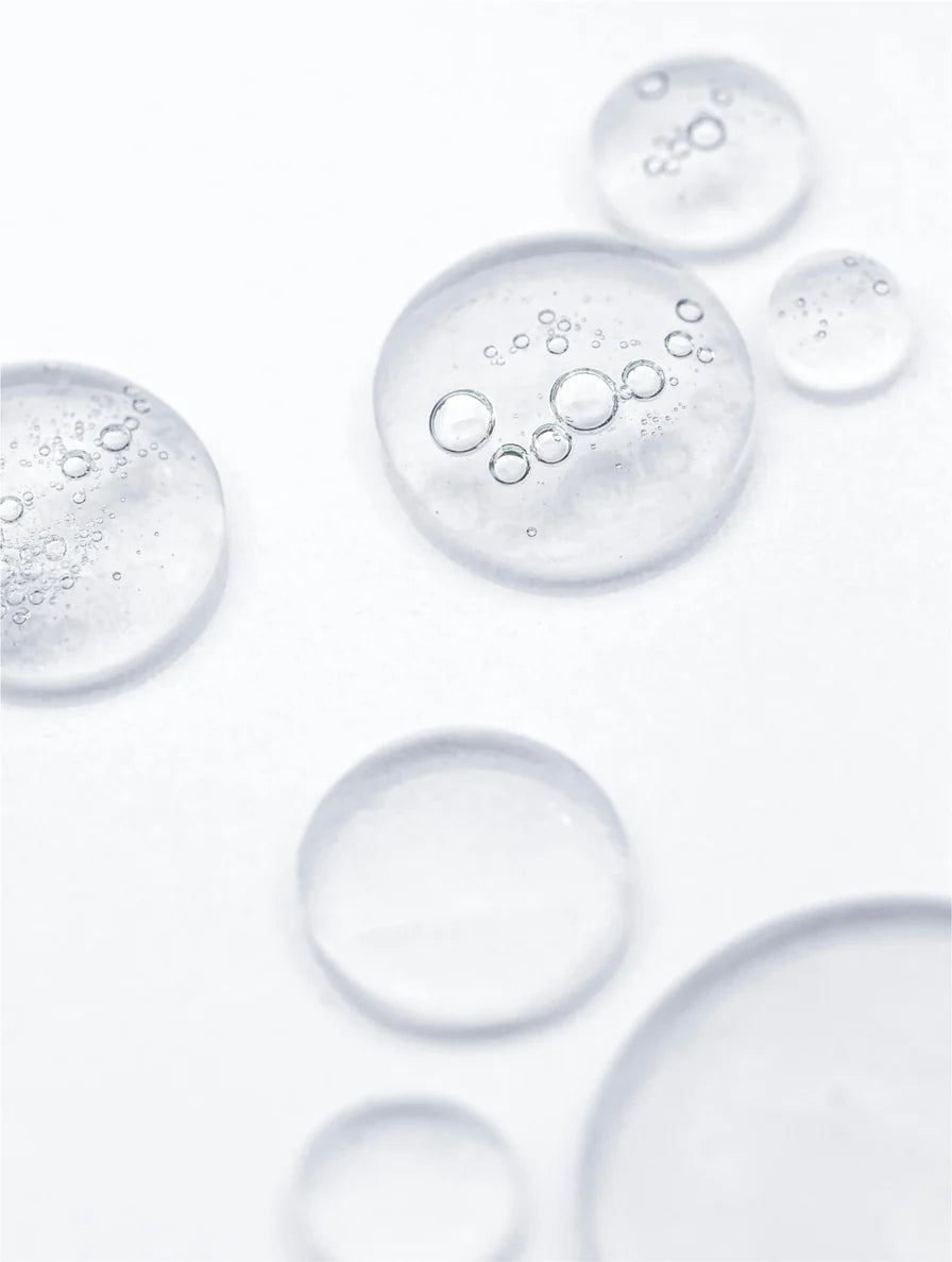 Clear bubbles on a light gray background