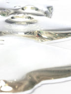 Close-up of clear water with ripples on a white background