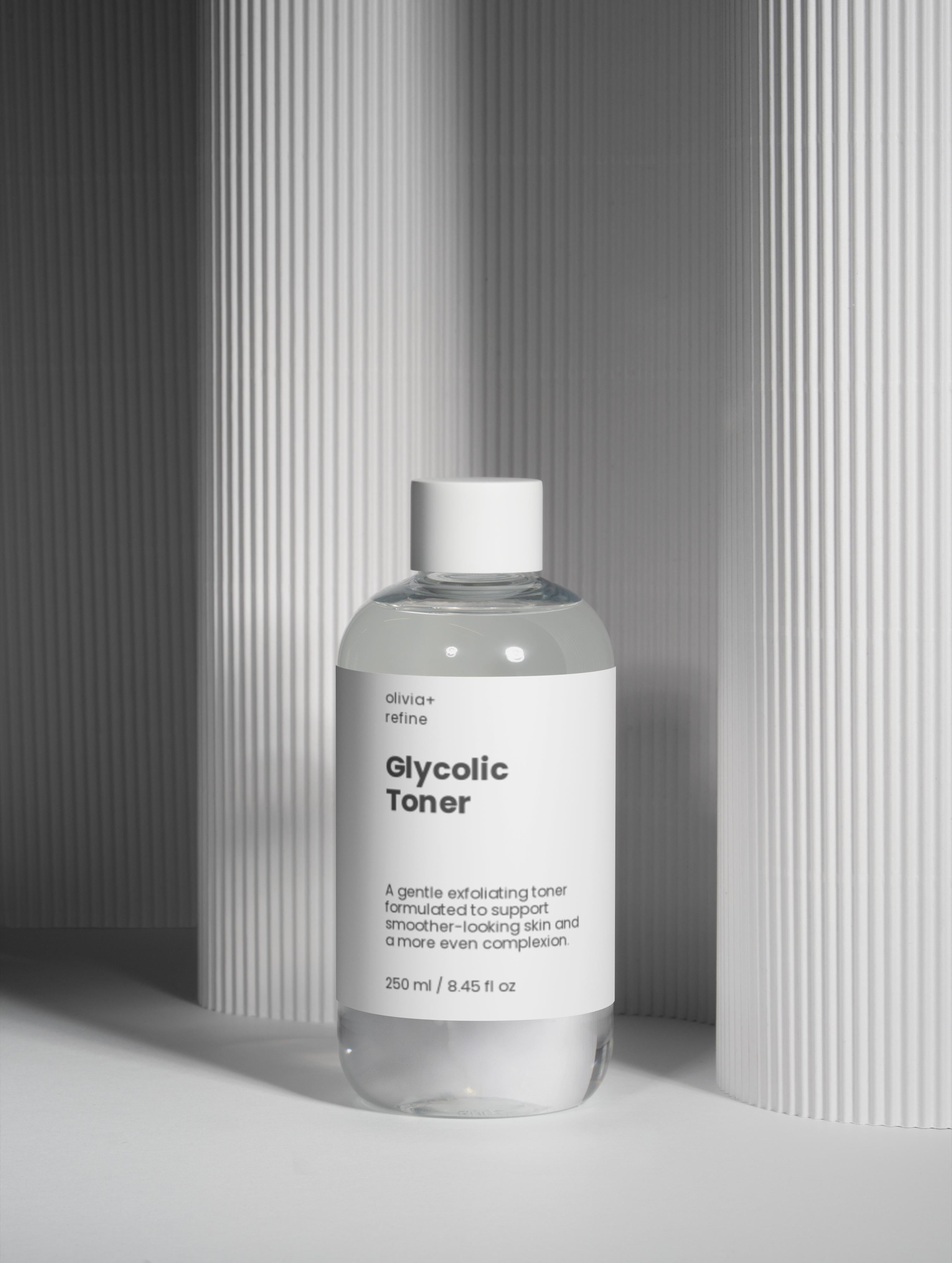 Bottle of Olivard Glycolic Acid Toning Solution on a gray background