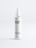 White bottle of Microbiome Prebiotics Face Mist on a white background