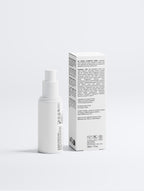 White skincare bottle and box on a light gray background
